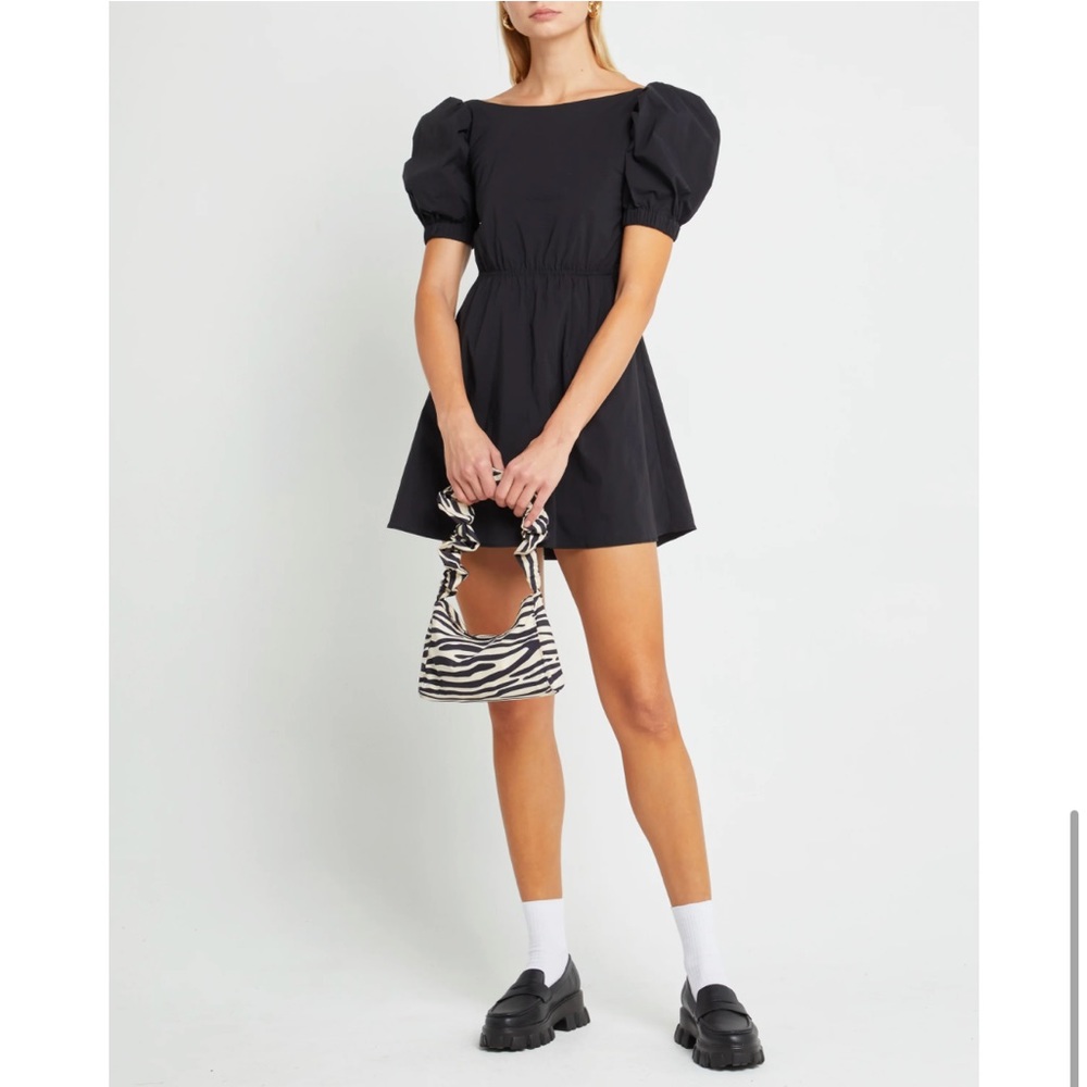 Size medium new with tags. Selling because it’s a little short on me - I’m 5’10”
